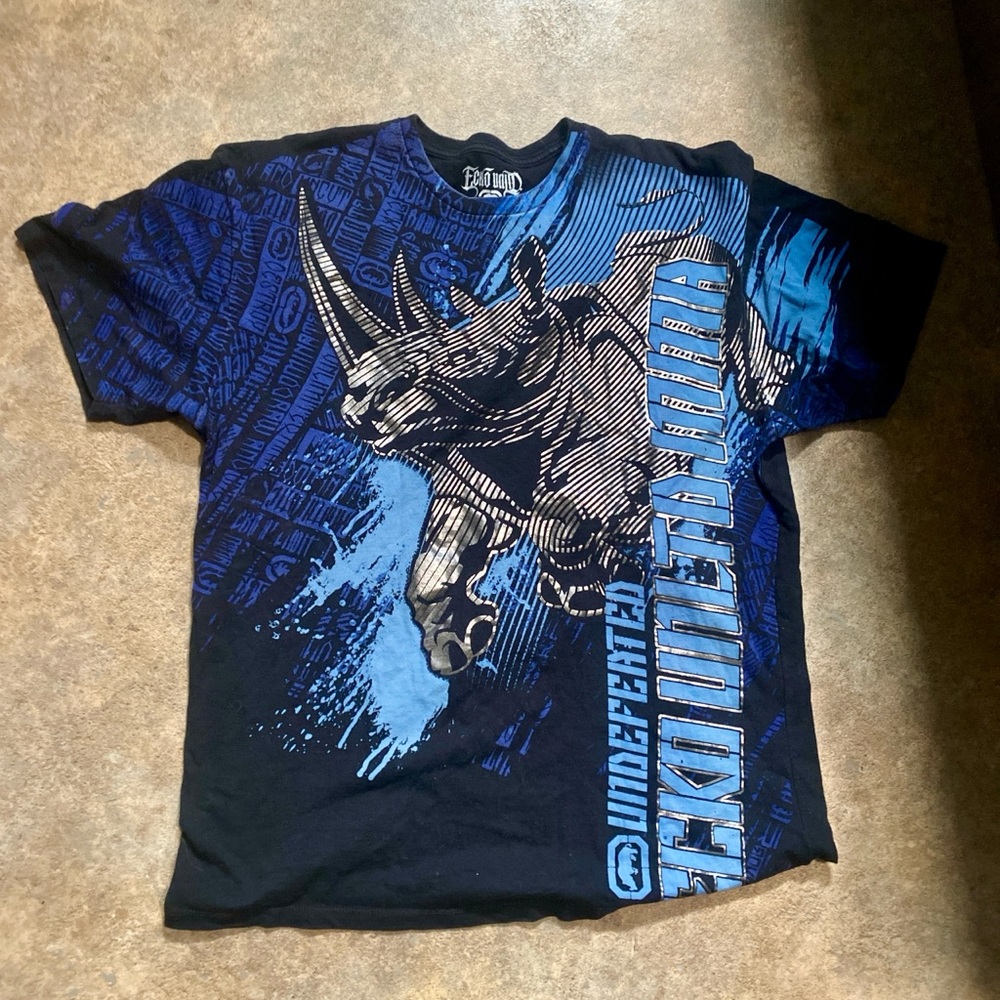 Ecko Unlimited Blue and Black Short Sleeve Tee with Dinosaur Design
